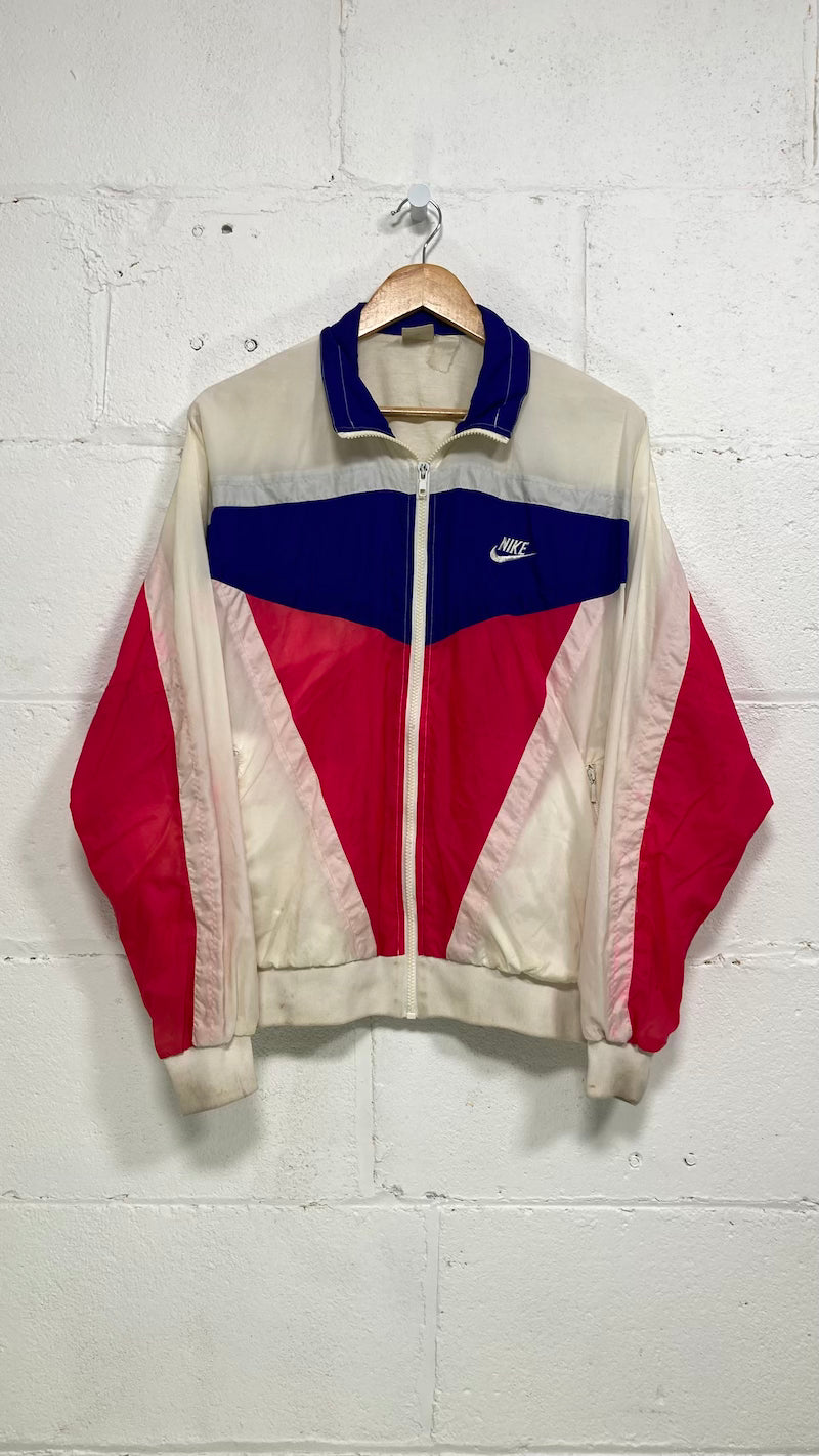 Purple and 2025 white nike jacket